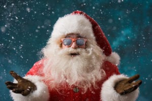 close up of Santa Claus in sunglasses