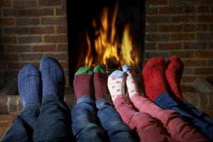 fireplace with row if stockinged feet