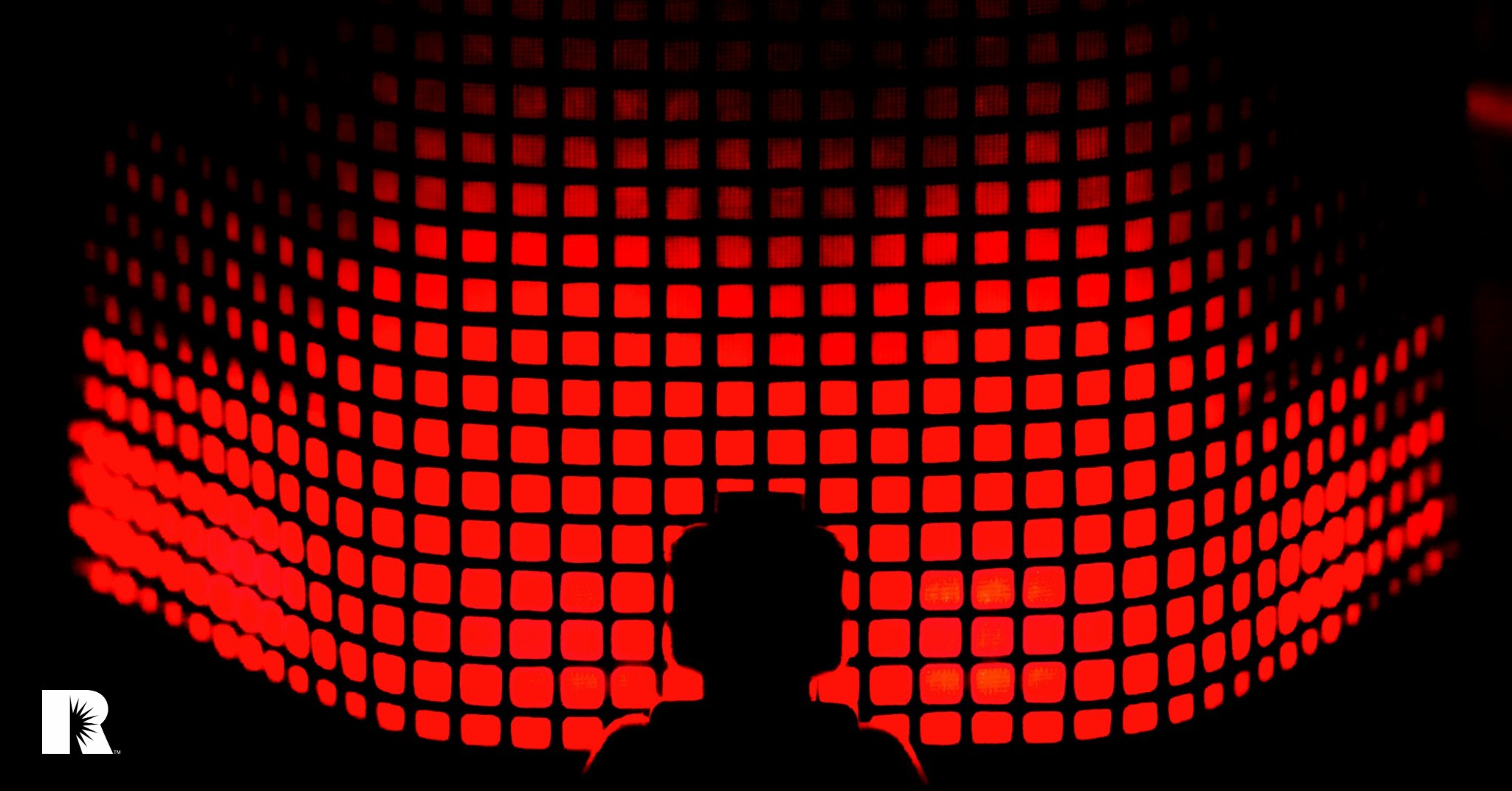 An image of a boy's silhouette against a red field of data bytes.