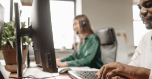 Insurance placement specialists working at their desks