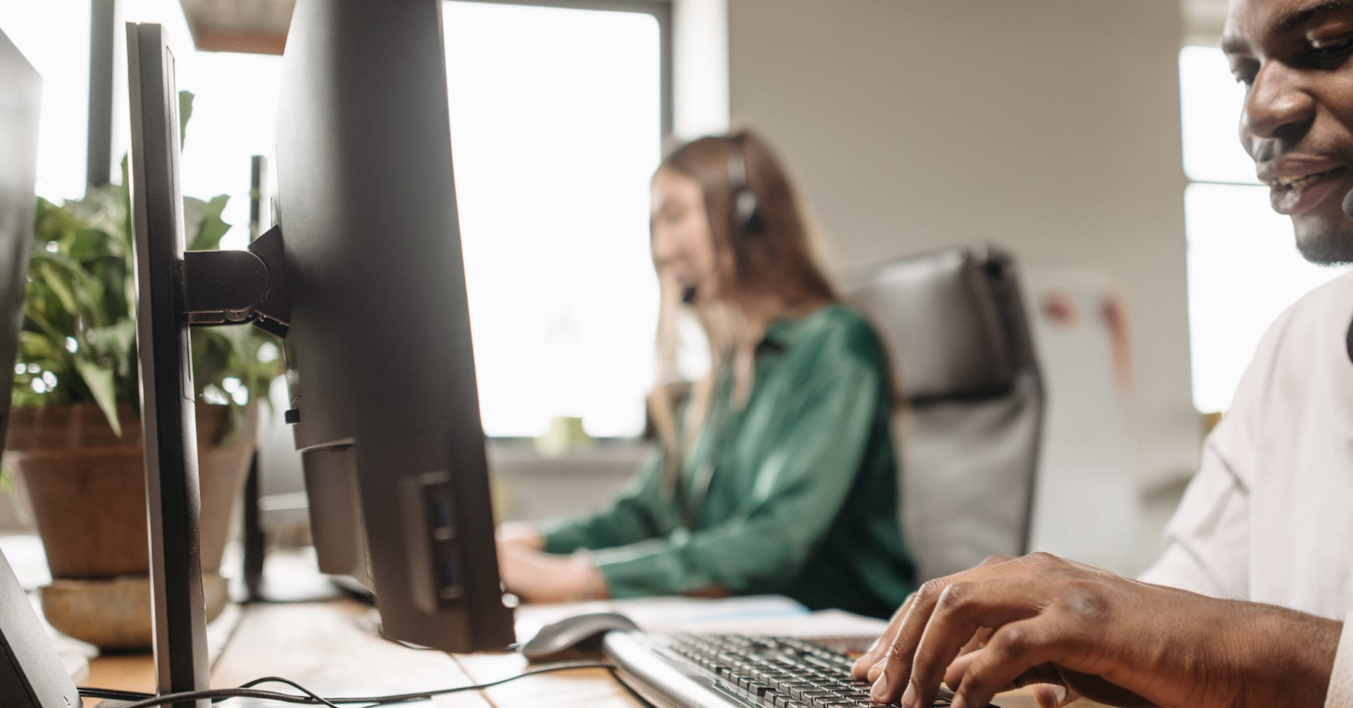 Insurance placement specialists working at their desks
