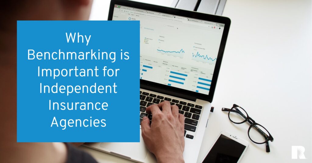 An insurance agent discovers the benefits of benchmarking while working on his laptop.
