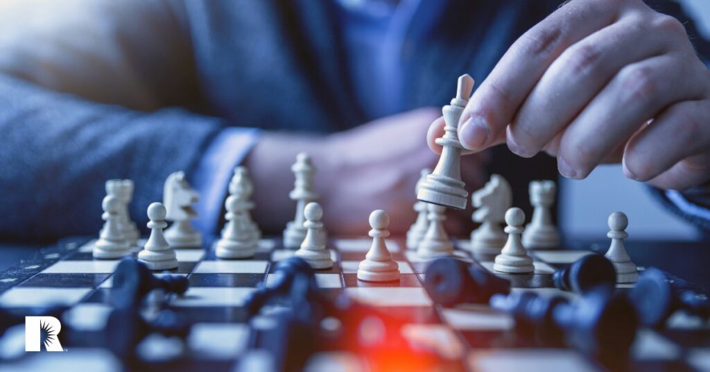 A photo illustration of a man playing chess.